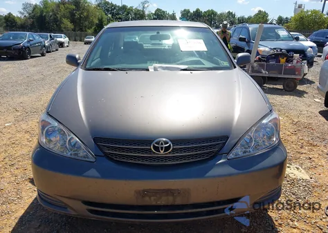 2002 Toyota Camry Le from USA, damaged, VIN 4T1BE32K12U589738